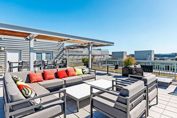 Rooftop grilling and bar serving area